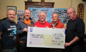 Pictured at the presentation of €500, proceeds of the Mask Swim Challenge to Ballinrobe Town Hall Committee members by Mask Swim Organisers, left to right: Alan Stephens (Ballinrobe Watersports Club Treasurer), Sean O'Connell (Town Hall Committee Treasurer), John Craddock (Mask Swim organiser and Craddock Electrical, sponsor), Michael Sweeney (Town Hall Committee Chairman), John Burke (Mask Swim organiser). Pic: Trish Forde.